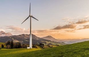 wind turbine with scenic mountain view